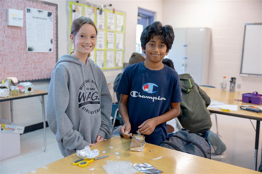 Students build penguin nests during an experiment